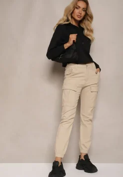 Beżowe Jeansy z Bawełny o Kroju Joggerów z Ozdobnymi Kieszeniami i Gumką w Pasie Unicella
