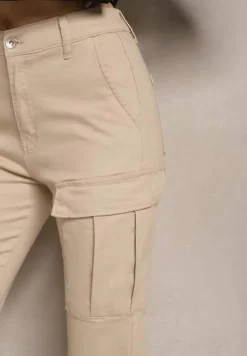 Beżowe Jeansy z Bawełny o Kroju Joggerów z Ozdobnymi Kieszeniami i Gumką w Pasie Unicella