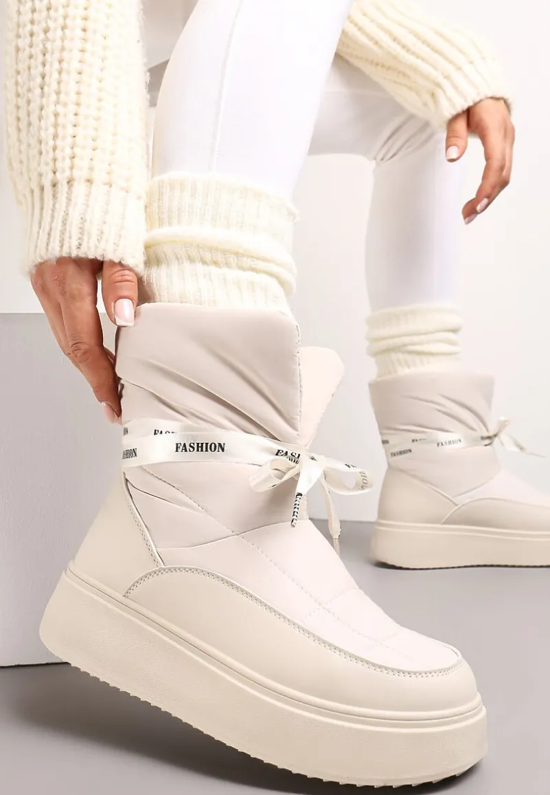 Beżowe Śniegowce z Ozdobną Wstążką Wokół Kostki Rohessi