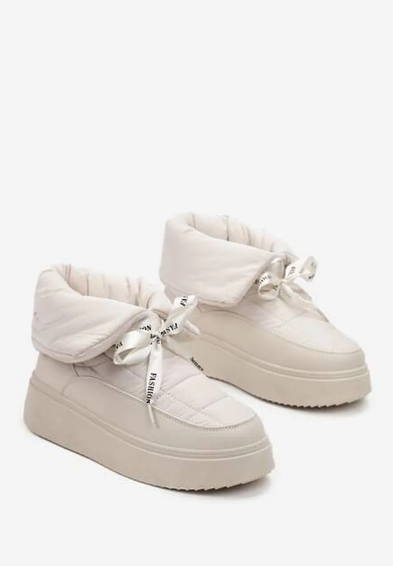 Beżowe Śniegowce z Ozdobną Wstążką Wokół Kostki Rohessi