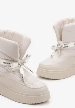 Beżowe Śniegowce z Ozdobną Wstążką Wokół Kostki Rohessi