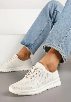 Beżowe Skórzane Buty Sportowe na Płaskiej Podeszwie ze Skórzaną Wkładką Ozdobione Perforacją Falali