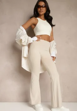 Beżowe Spodnie Dzwony Legginsy High Waist Onellin