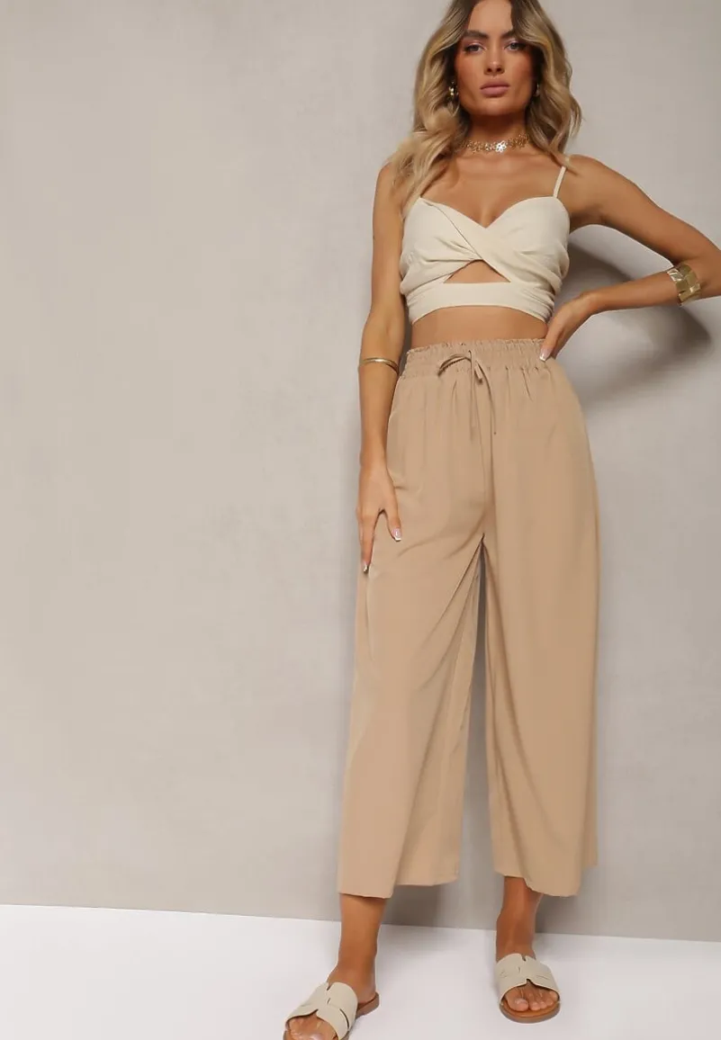 Beżowe Spodnie High Waist z Szerokimi Nogawkami z Wiskozą Wykończone Gumką w Talii Crisantas
