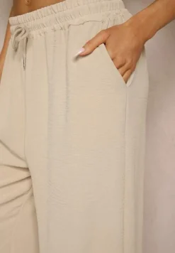 Beżowe Spodnie High Waist ze Sznurkiem w Talii i Prostą Nogawką Raveann