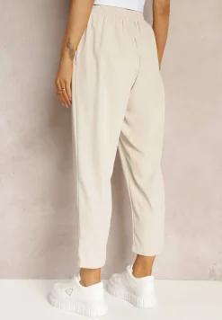 Beżowe Spodnie High Waist z Gumką i Troczkiem w Pasie oraz Kieszeniami Arlettia