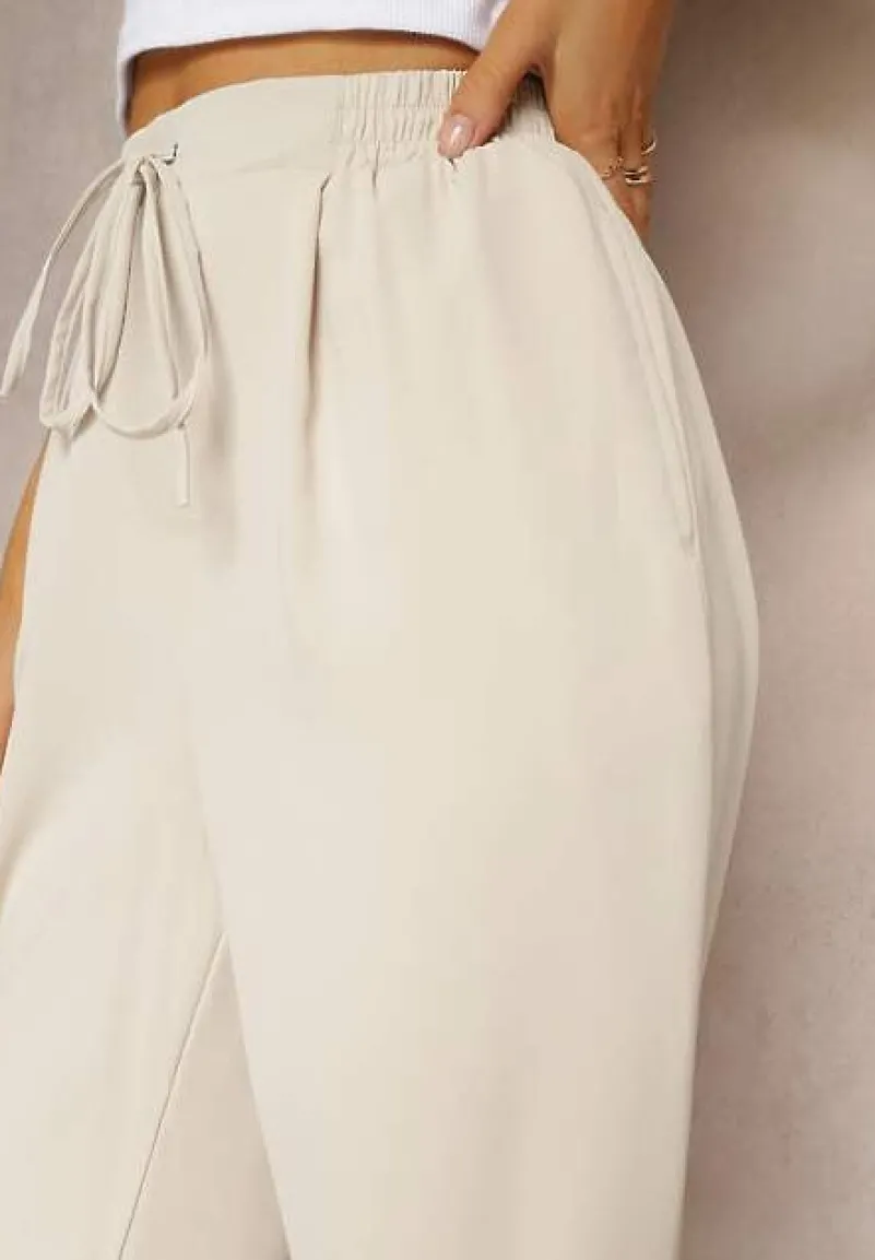 Beżowe Spodnie High Waist z Gumką i Troczkiem w Pasie oraz Kieszeniami Arlettia