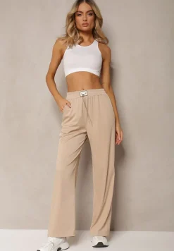 Beżowe Spodnie High Waist o Luźnym Fasonie z Łańcuszkiem przy Pasie Ustar