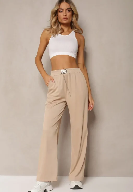 Beżowe Spodnie High Waist o Luźnym Fasonie z Łańcuszkiem przy Pasie Ustar