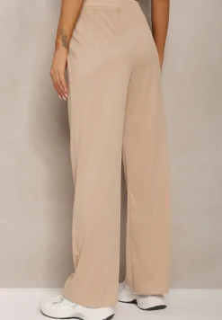 Beżowe Spodnie High Waist o Luźnym Fasonie z Łańcuszkiem przy Pasie Ustar