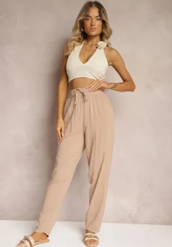 Beżowe Wiskozowe Spodnie z Gumką w Talii i Zwężanymi Nogawkami Sumipaku