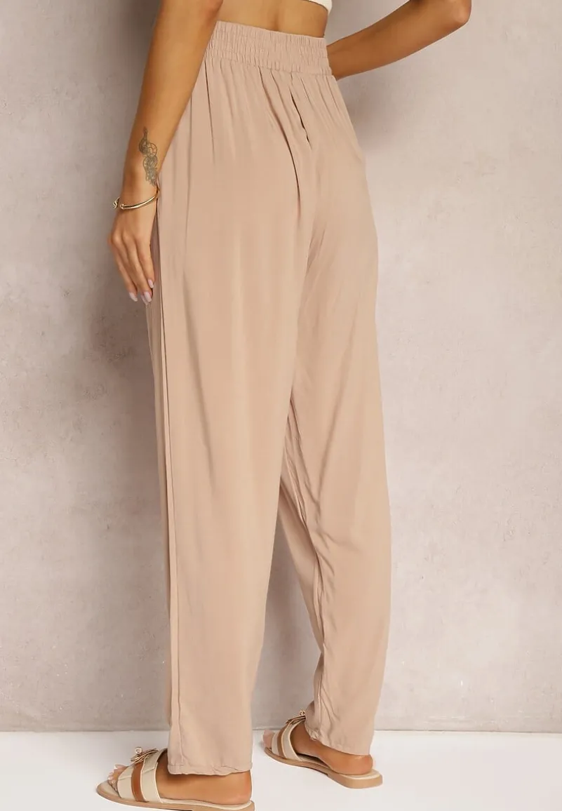 Beżowe Wiskozowe Spodnie z Gumką w Talii i Zwężanymi Nogawkami Sumipaku
