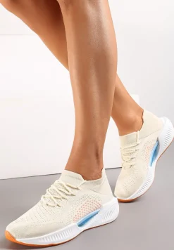 Beżowe Wsuwane Buty Sportowe z Elastyczną Cholewką i Ozdobną Podeszwą Instonia