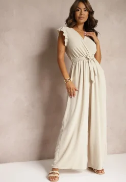 Beżowy Koktajlowy Kombinezon Wiązany Paskiem Wykończony Falbankami przy Ramionach Vimaseni