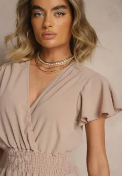 Beżowy Kombinezon o Kopertowym Kroju z Gumką w Talii Martalia