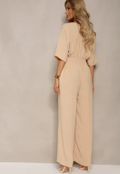 Beżowy Kombinezon o Kopertowym Fasonie z Szerokim Luźnym Dołem i Kieszeniami Octoni