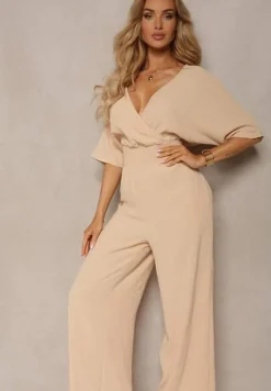Beżowy Kombinezon o Kopertowym Fasonie z Szerokim Luźnym Dołem i Kieszeniami Octoni