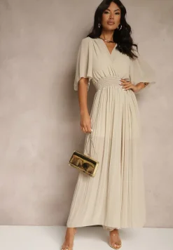 Beżowy Kombinezon z Kopertowym Dekoltem i Gumką w Pasie Zdobiony Plisami Amadle