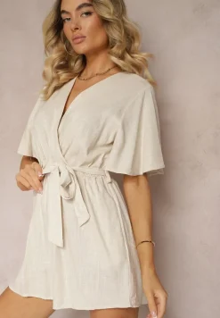 Beżowy Kopertowy Kombinezon z Bawełny Wiązany w Talii Materiałowym Paskiem Vikly