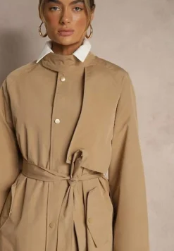 Beżowy Płaszcz w Stylu Trencza Vintage z Asymetryczną Zakładką i Paskiem Davivellea
