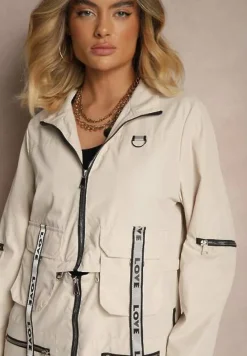 Beżowy Płaszcz z Regulowaną Długością i Ozdobnymi Wstawkami Nainika