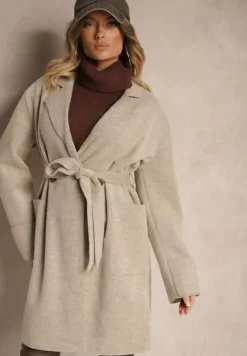Beżowy Płaszcz z Wiskozą o Dwurzędowym Kroju z Kieszeniami i Wiązanym Paskiem Ninneta