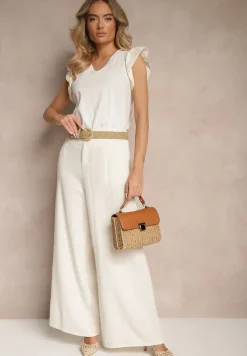 Biała Bawełniana Bluzka z Falbanką Przy Ramionach Ozdobioną Haftem Helabina