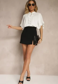 Biała Bluzka z Falbanami i Wiązaniem Fadeassa