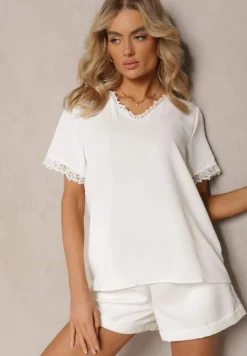 Biała Bluzka z Trójkątnym Dekoltem Ozdobiona Siateczką Tirvana