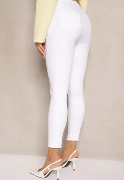 Białe Jeansy z Bawełny Typu Skinny High Waist Ozdobione Dziurami na Kolanach Noviressa