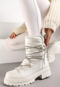 Białe Śniegowce na Platformie z Wiązaniem w Cyrkonie Brelara