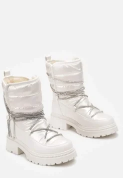 Białe Śniegowce na Platformie z Wiązaniem w Cyrkonie Brelara