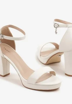 Białe Sandały Vices na Słupkowym Obcasie z Paskiem Wokół Kostki Maritira