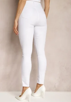 Białe Skinny Jeansy Ozdobione Dziurami i Przetarciami Riloevi