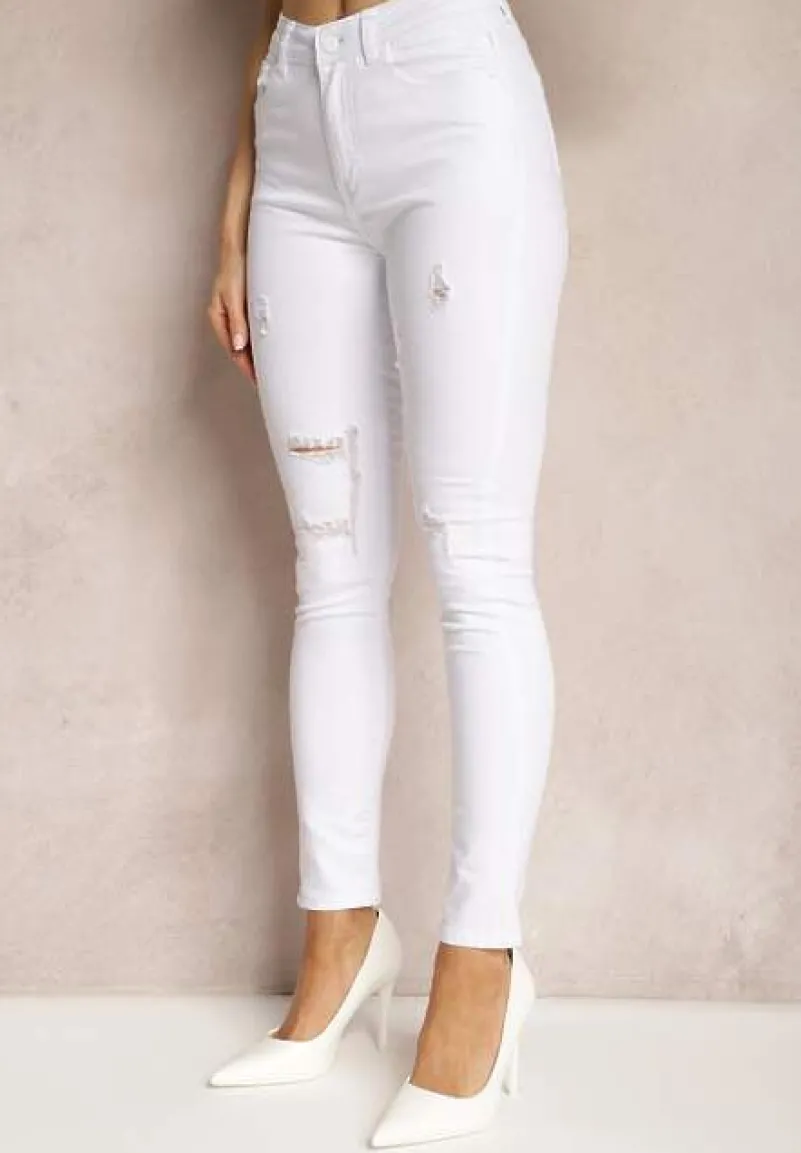 Białe Skinny Jeansy Ozdobione Dziurami i Przetarciami Riloevi