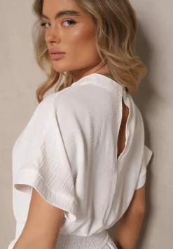 Biały Wiskozowy Kombinezon z Dekoltem w Serek Zapinany na Guziki Anisora