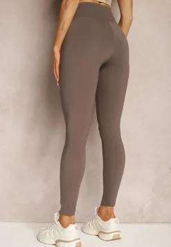 Brązowe Casualowe Spodnie Legginsy High Waist Wykończone Szerokim Pasem Uliantia