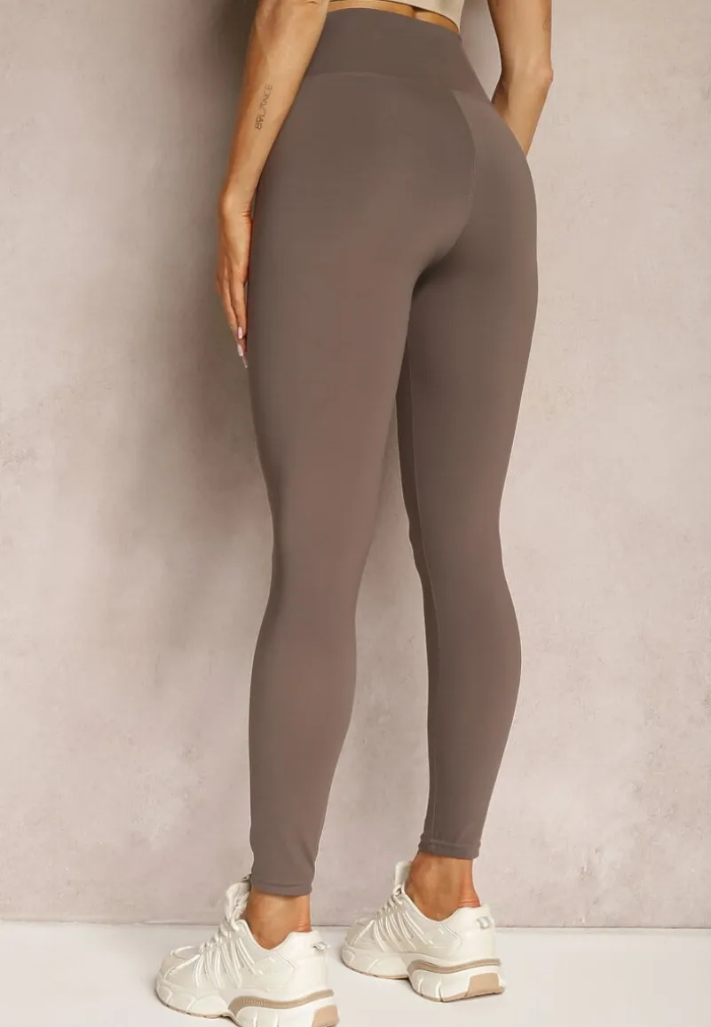 Brązowe Casualowe Spodnie Legginsy High Waist Wykończone Szerokim Pasem Uliantia