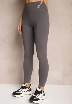 Ciemnoszare Sportowe Legginsy High Waist z Małym Ozdobnym Znaczkiem Lerilane