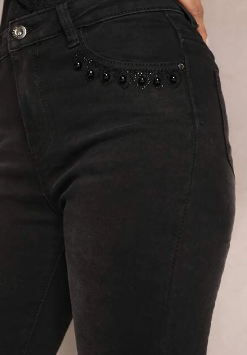 Czarne Jeansy o Fasonie Skinny z Cyrkoniami Przy Kieszeniach Aklesse