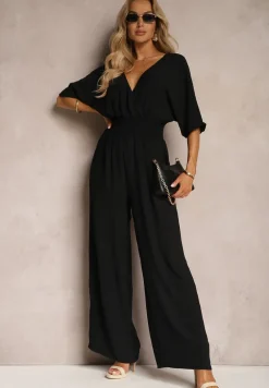Czarny Kombinezon o Kopertowym Fasonie z Szerokim Luźnym Dołem i Kieszeniami Octoni