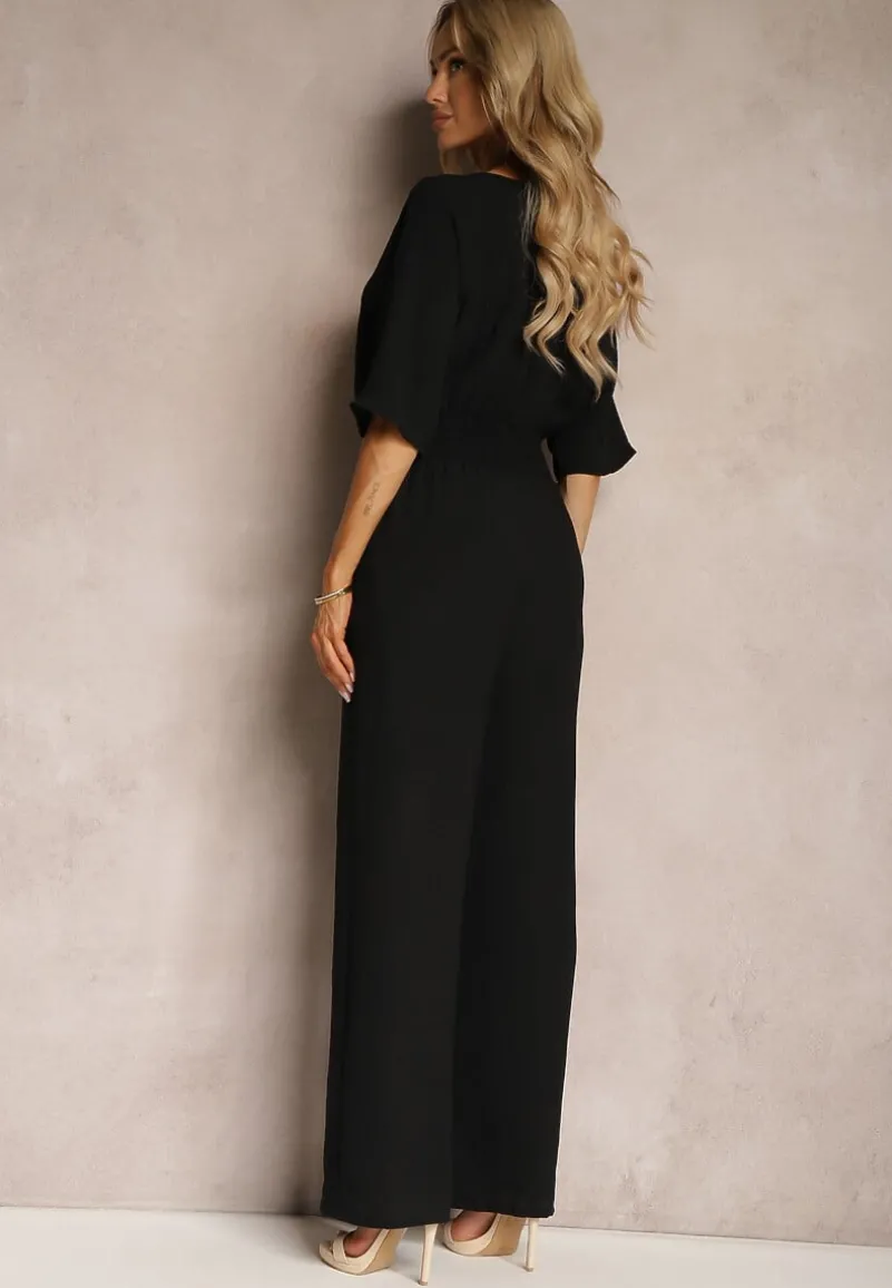 Czarny Kombinezon o Kopertowym Fasonie z Szerokim Luźnym Dołem i Kieszeniami Octoni