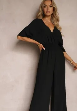 Czarny Kombinezon o Kopertowym Fasonie z Szerokim Luźnym Dołem i Kieszeniami Octoni