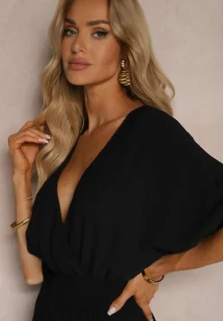 Czarny Kombinezon o Kopertowym Fasonie z Szerokim Luźnym Dołem i Kieszeniami Octoni