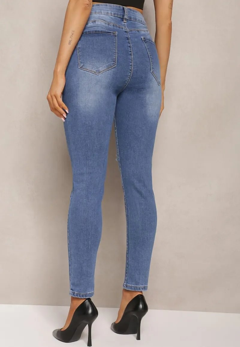 Granatowe Dopasowane Jeansy Skinny z Efektem Push Up i Przedarciami Avotia