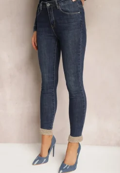 Granatowe Skinny Jeansy ze Sztucznym Futerkiem przy Kostkach Pelle
