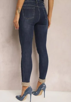 Granatowe Skinny Jeansy ze Sztucznym Futerkiem przy Kostkach Pelle
