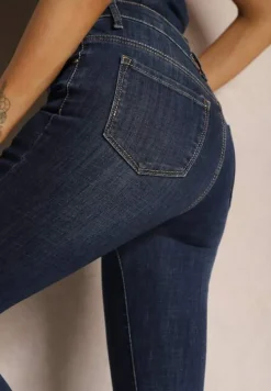 Granatowe Skinny Jeansy ze Sztucznym Futerkiem przy Kostkach Pelle