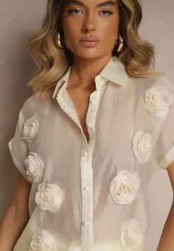 Jasnobeżowa Koszula z Długim Rękawem Zapinana na Guziki Ozdobiona Aplikacją w Formie Kwiatu Parslea