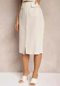 Jasnobeżowa Spódnica o Trapezowym Kroju Ozdobiona Kieszeniami i Rozcięciem Nestanie